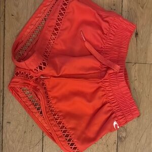 Girls red o’neill swim shorts size 7.